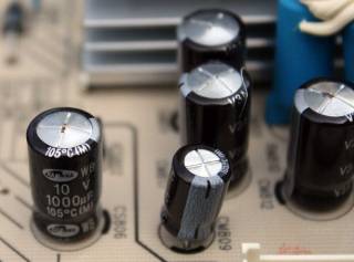 repairing-samsung-lcd-tv-lnt4065fx-xaa-bad-capacitors-with-bulging-tops-on-power-supply-board.jpg
